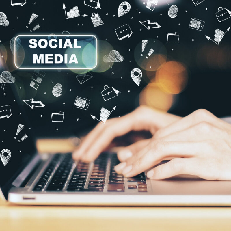 hands-using-laptop-with-social-media-sketch-commu-2026-03-26-04-44-24-utc